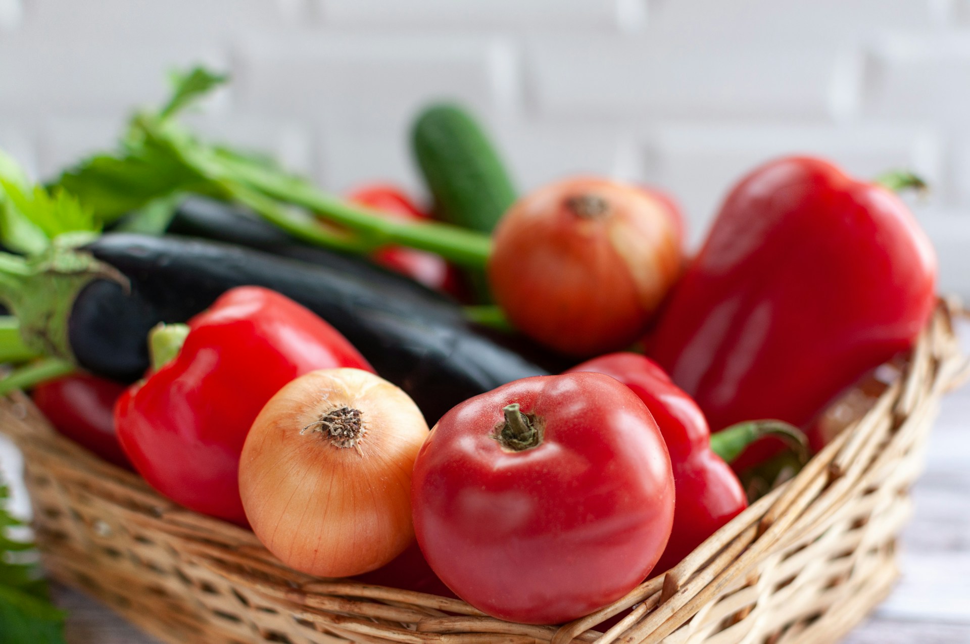 a basket filled with lots of different types of vegetables