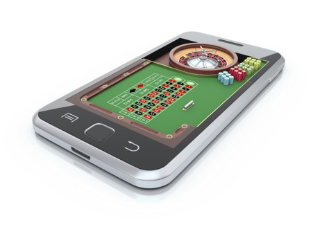 Smartphone displaying a roulette game app with betting chips on screen.