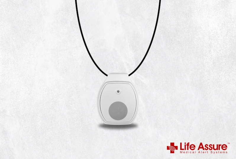 Life Assure medical alert pendant with a single emergency button on a black cord.